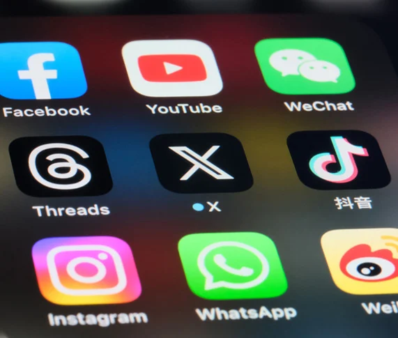 Social media app icons on a smartphone screen