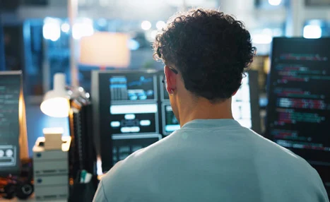 Technician working in a server room